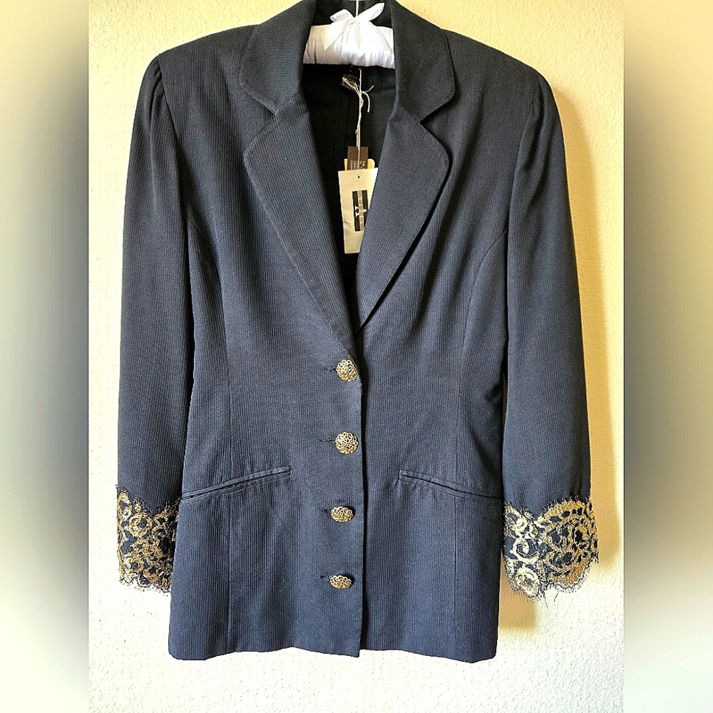 This is a Vintage 90's Vizia New 2pc Suit Black With Gold Accents Sizes 4,6 & 8
